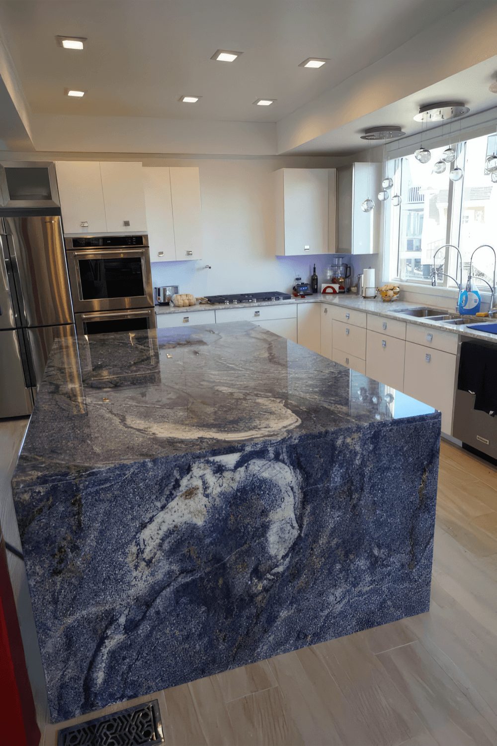 Quartz countertops over cabinets in a West Palm Beach kitchen